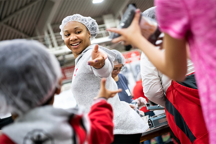 Approximately 600 Ohio State University students, student-athletes and staff members from the Office of Student Life, Department of Athletics and Alumni Association packing more than 200,000 meals at French Field House. The meals, combined with 125,000 non-perishable meals packed by Ohio State students earlier this month, will be donated Wednesday to the Military Veterans Resource Center (MRVC) for distribution through their Veterans Food Banks in Ohio.