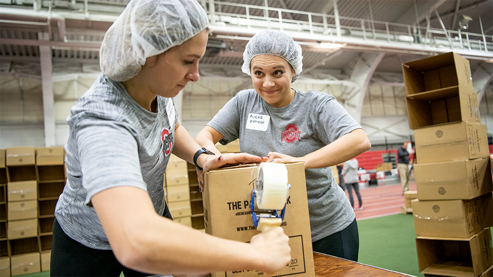 Approximately 600 Ohio State University students, student-athletes and staff members from the Office of Student Life, Department of Athletics and Alumni Association packing more than 200,000 meals at French Field House. The meals, combined with 125,000 non-perishable meals packed by Ohio State students earlier this month, will be donated Wednesday to the Military Veterans Resource Center (MRVC) for distribution through their Veterans Food Banks in Ohio.