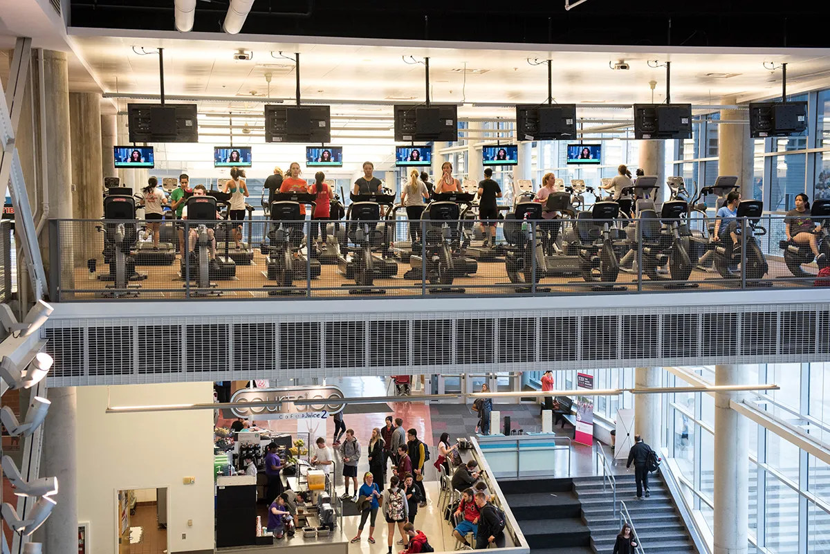 Students using the facilities across two floors at the Recreation Physical Activity Center.
