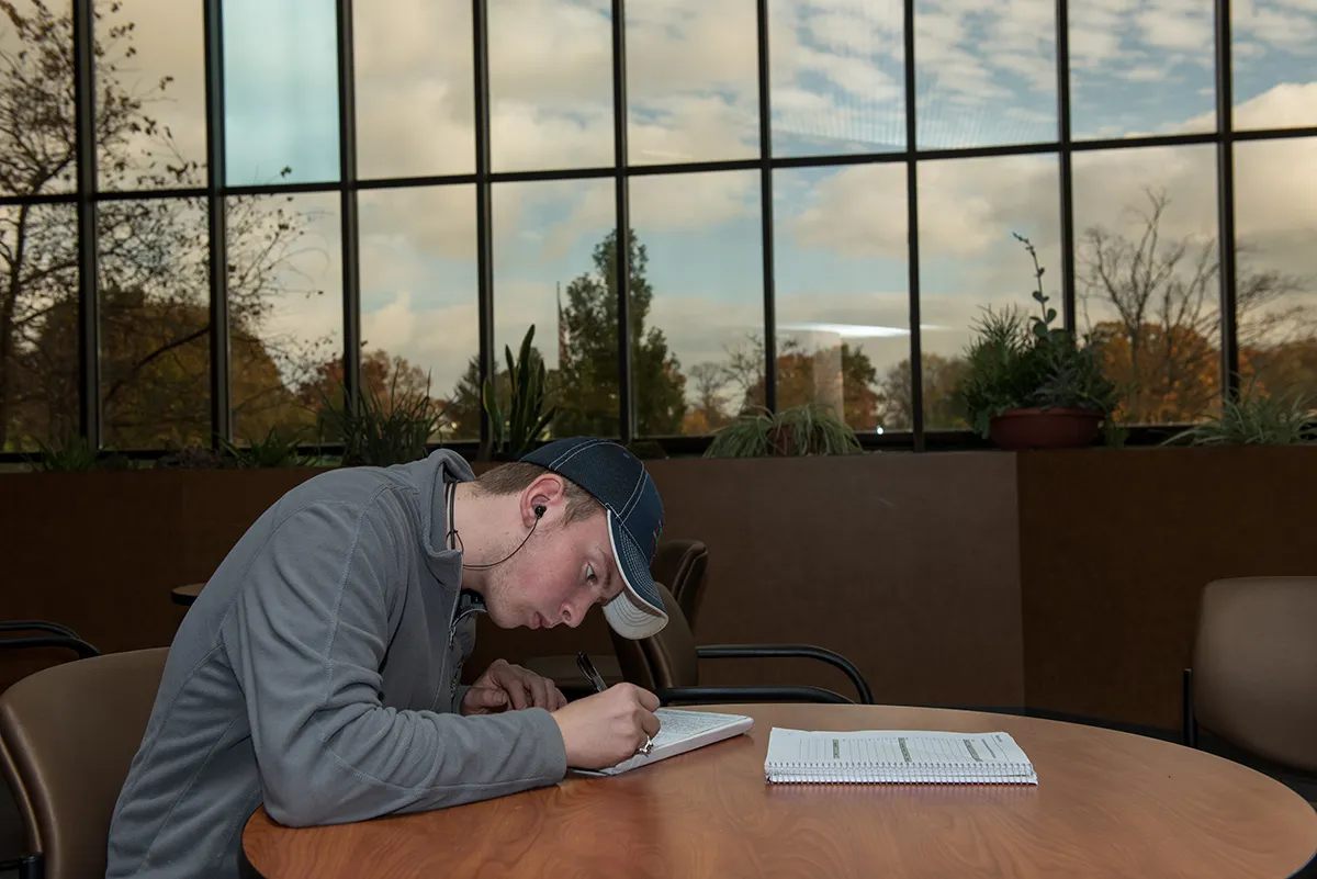 A student studies in a study space at CFAES Wooster.
